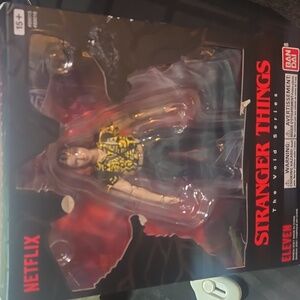 Stranger Things Bandai 6" Yellow Costume Eleven Figure. brand new in box  ..